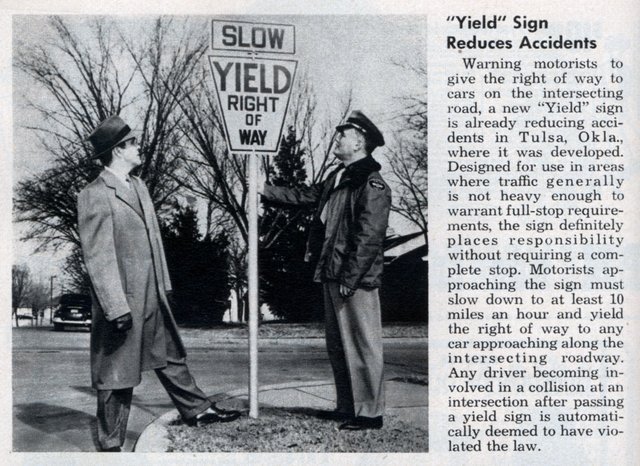 Clinton E. Riggs with first yield sign in the worldat 1st & Columbia, Tulsa, OK.