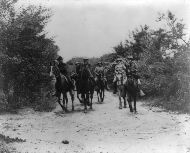 Generals Miles, Shafter, and Wheeler returning from the conference with General H. Toral, which resulted in the surrender of the Province of Santiago de Cuba, 1898. Photo by William Dinwiddie, courtesy Library of Congress.