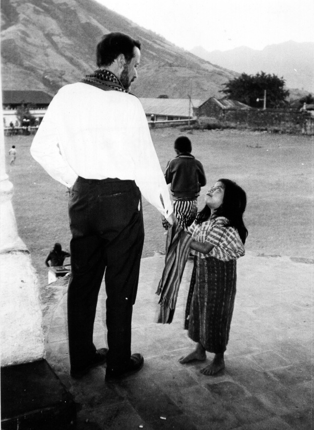 Father Stanley Rother standing with a young girl in Santiago Atitlán, Guatemala. Courtesy of the Archives of the Archdiocese of OKC.